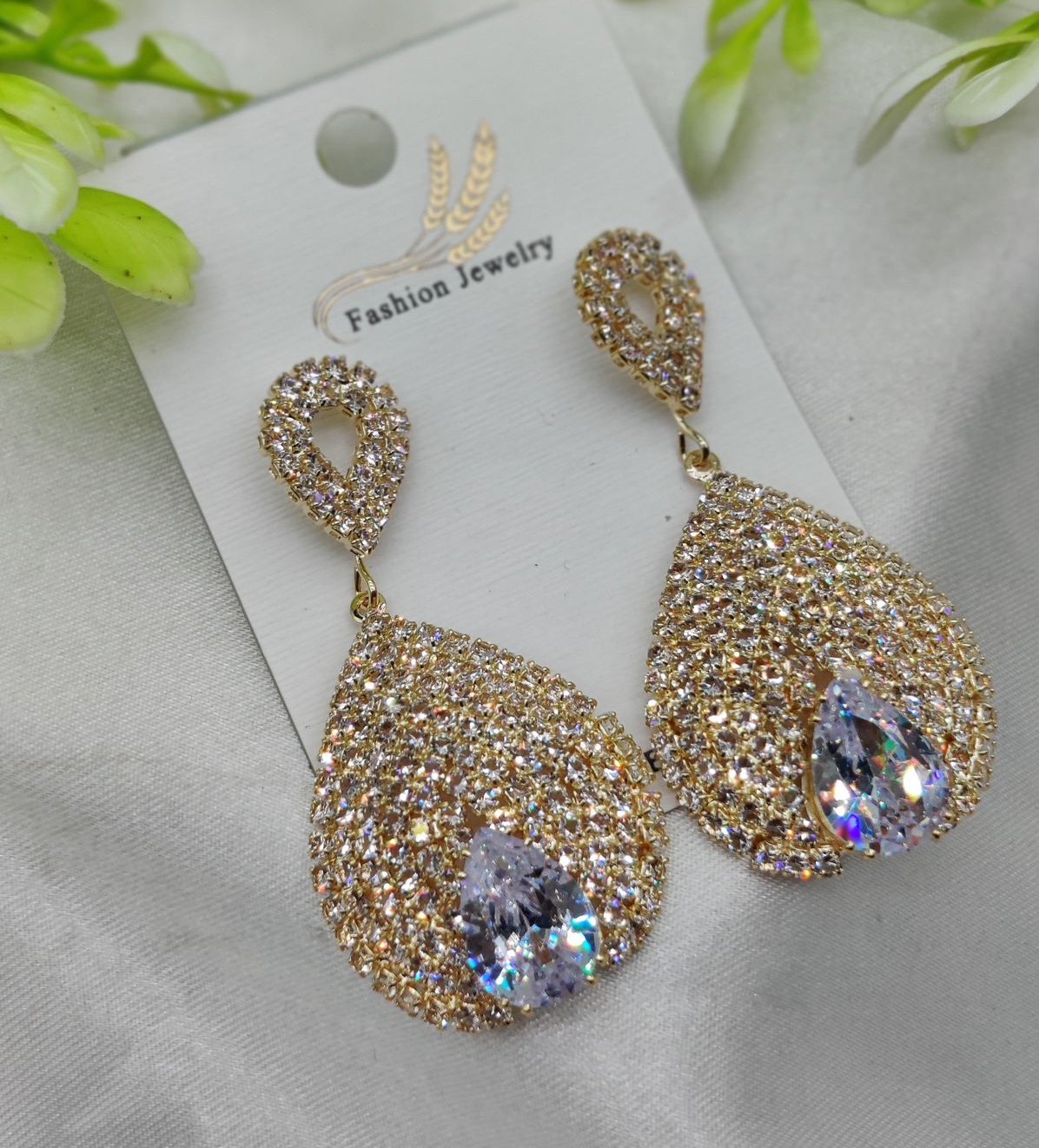Luxurious Teardrop Crystal Earrings with Pave Detailing Earrings - Luxurious Gold Finish | Best Quality Artificial Earrings For Girls & Women